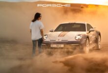 Dashing across the dunes in a Porsche 911 Dakar