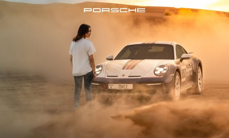 Dashing across the dunes in a Porsche 911 Dakar